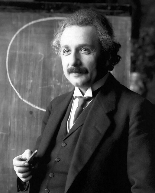 A black and white portrait of Albert Einstein.