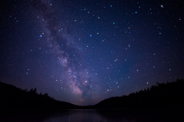An image of the night sky with the Milky Way Galaxy clearly visible to the naked eye