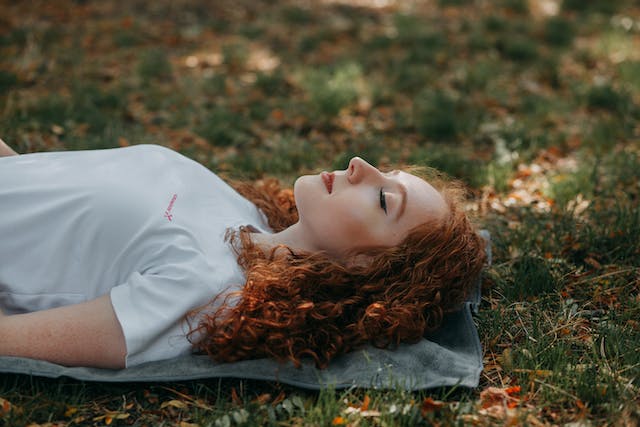Woman sleeping outdoors